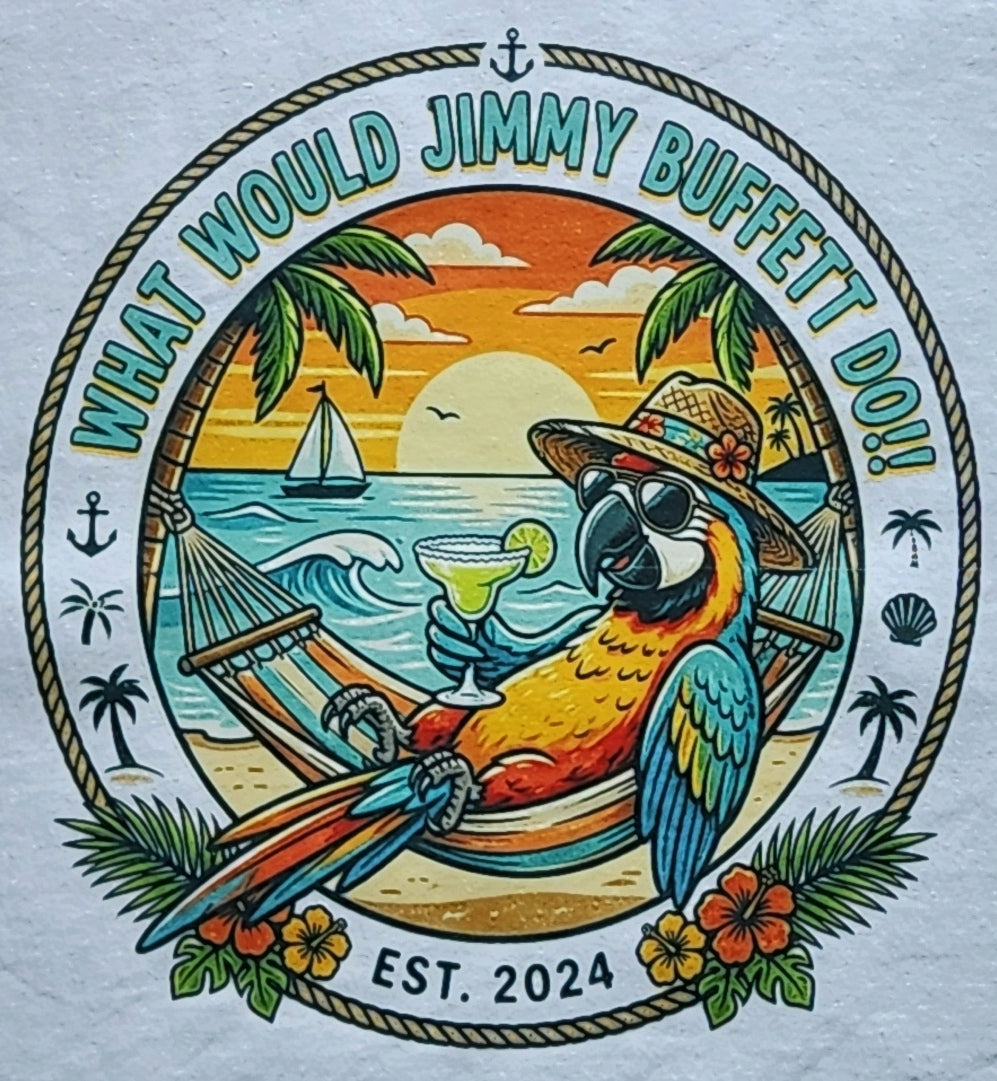 A circular graphic design printed on a white fabric background, featuring a colorful parrot lounging in a hammock by the ocean, holding a margarita. The design includes palm trees, a sunset, a sailboat, and the text 'WHAT WOULD JIMMY BUFFETT DO!' 