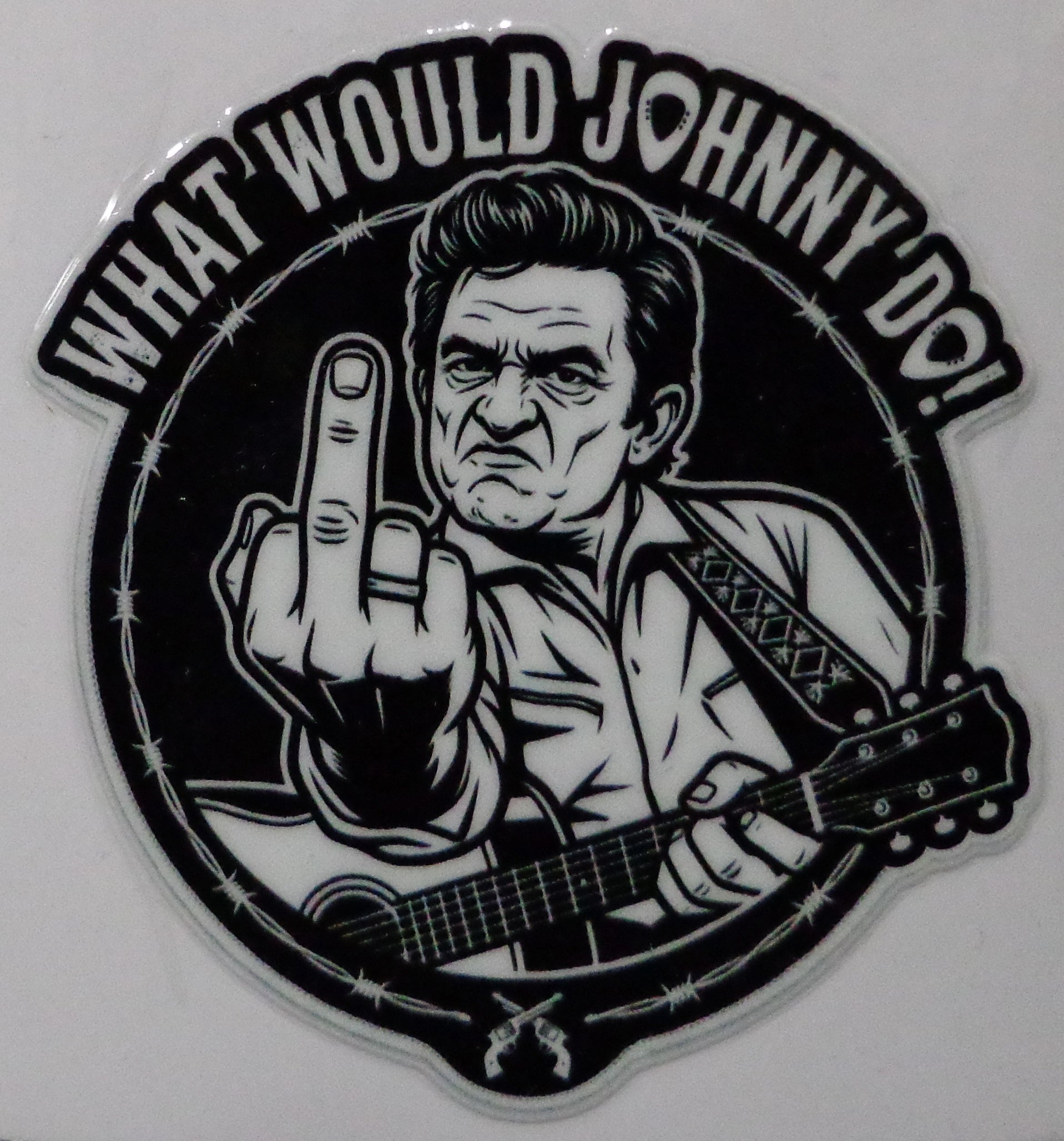  black-and-white circular sticker featuring a illustrated Johnny Cash and the text 'WHAT WOULD JOHNNY DO?'.