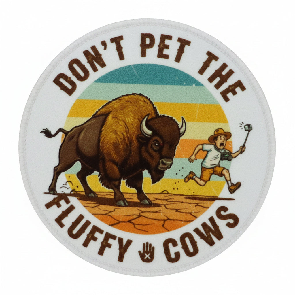 Round sticker with a bison and person, text 'Don't pet the fluffy cows' 
