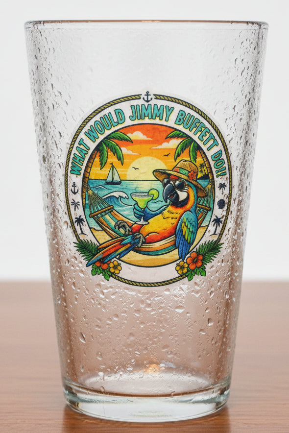 A circular tropical beach-themed sticker or decal featuring a parrot in a straw hat holding a margarita in a hammock, with palm trees, a sailboat, and the text 'WHAT WOULD JIMMY BUFFETT DO!' around the edge.