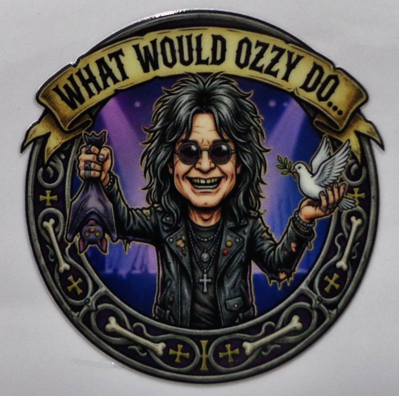 A circular illustrated sticker featuring a caricature of Ozzy Osbourne with the text 'WHAT WOULD OZZY DO.