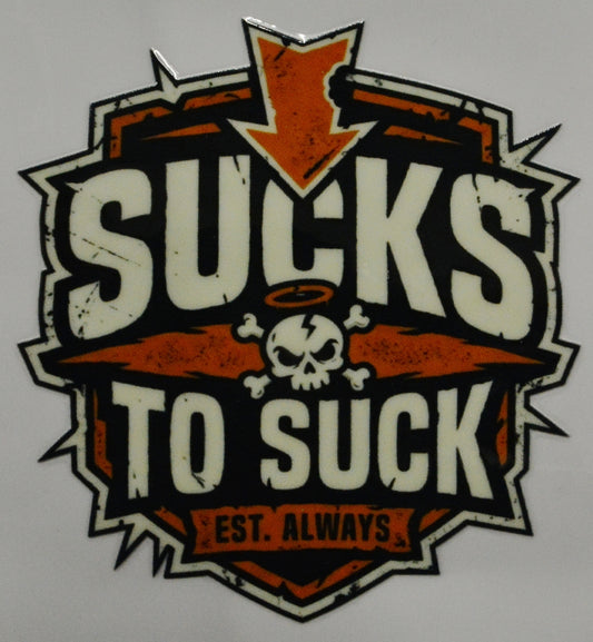 Sticker with text 'Sucks to Suck' and skull design 