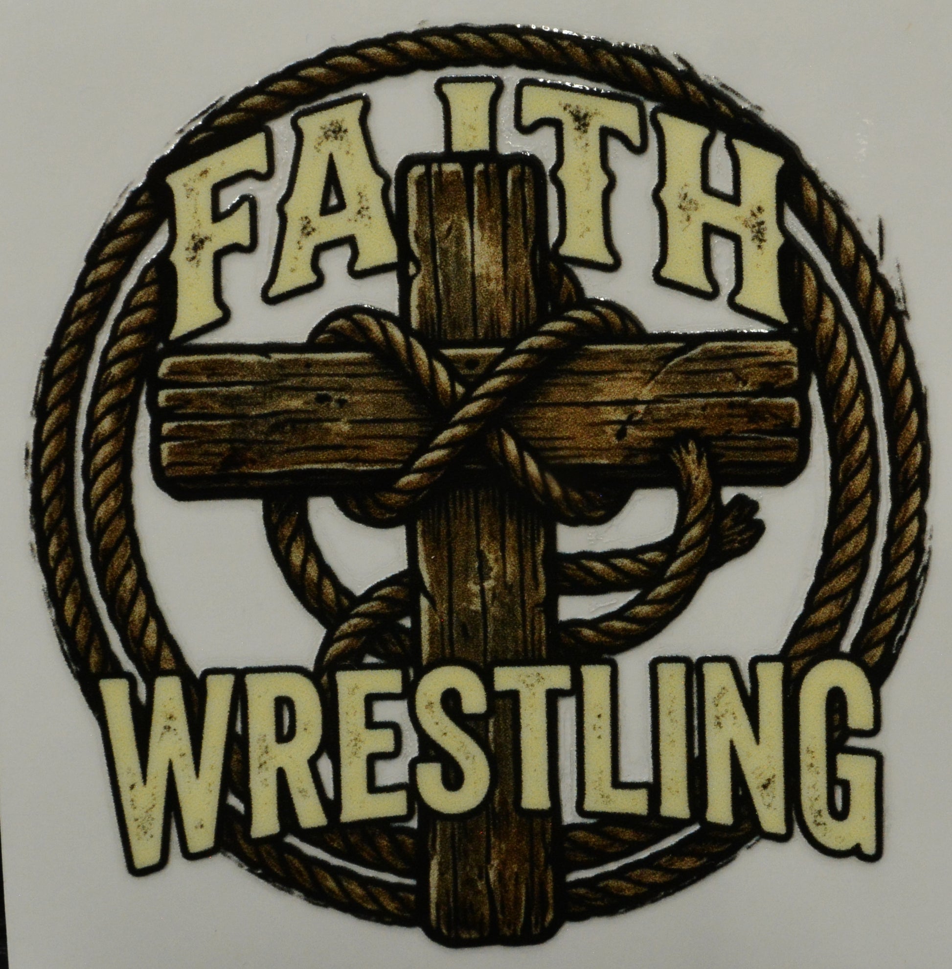 Logo with a cross and rope, featuring the text 'Faith Wrestling' on a white background.