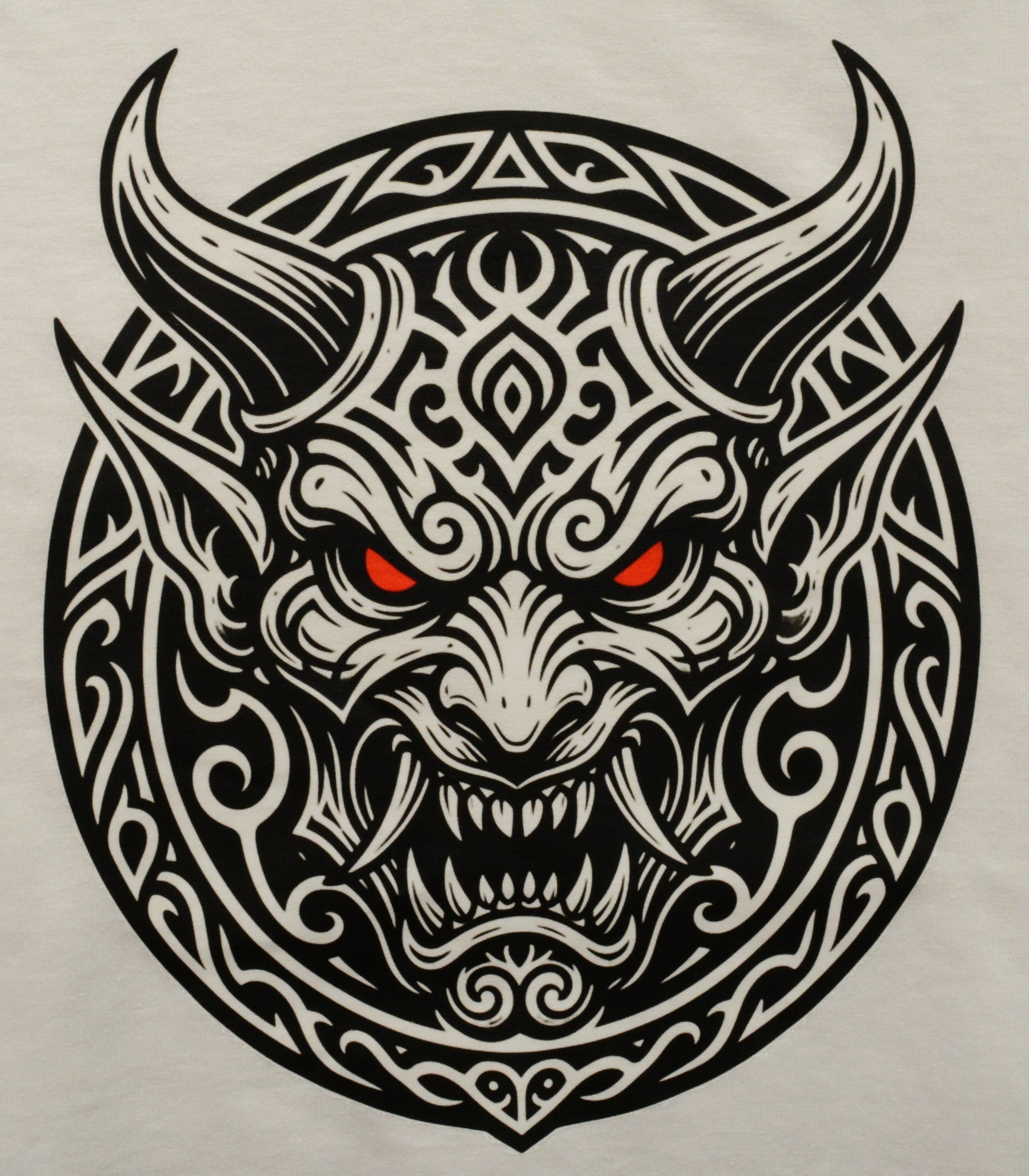 Black and white Japanese Demon head tattoo design with red eyes on a light gray background