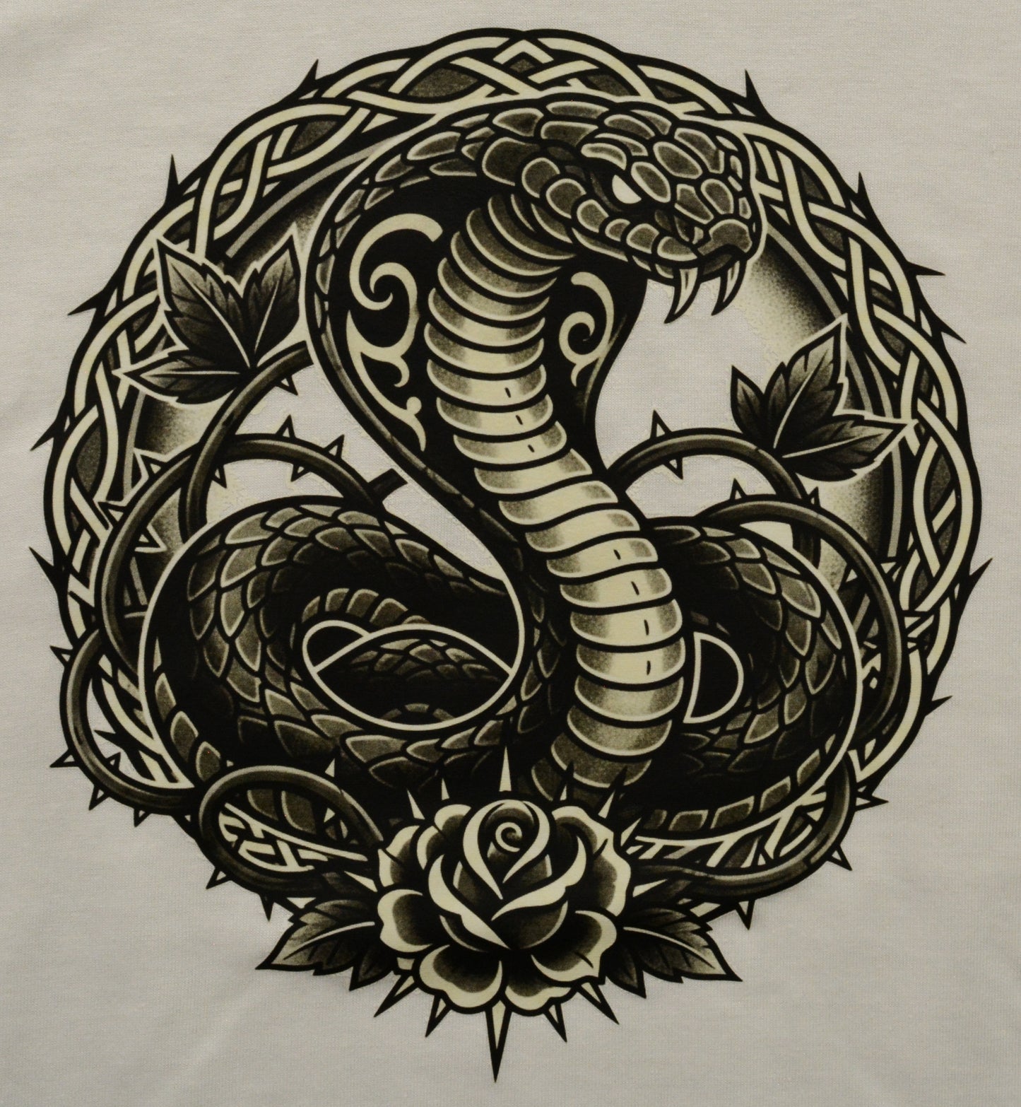 Decorative design of a snake coiled around a rose with intricate patterns on a white background